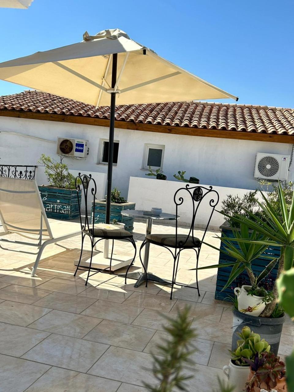 L'Artisan Hotel Harqalah Exterior foto